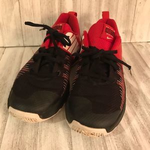 Women’s Nike Hustle Quick in size 8 also 6Y . Red and black in color